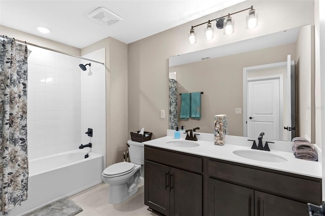 872 Griffon Ave, Lake Alfred, FL 33850 - bathroom featuring double vanity, shower / tub combo with curtain, and tile patterned flooring