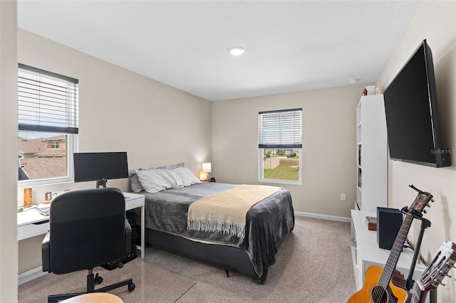 872 Griffon Ave, Lake Alfred, FL 33850 - bedroom featuring multiple windows, carpet, and an office area