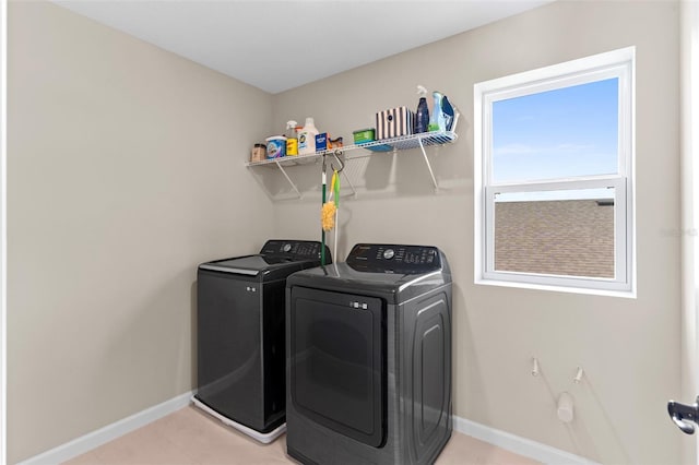872 Griffon Ave, Lake Alfred, FL 33850 - washroom featuring independent washer and dryer and light tile patterned floors