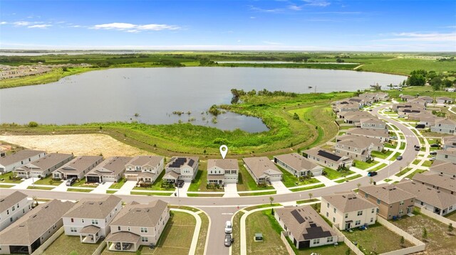 872 Griffon Ave, Lake Alfred, FL 33850 - aerial perspective of suburban area with a large body of water