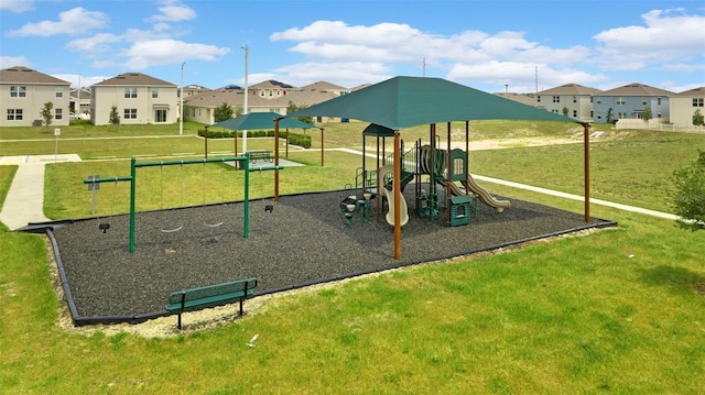 872 Griffon Ave, Lake Alfred, FL 33850 - communal playground featuring a residential view and a yard