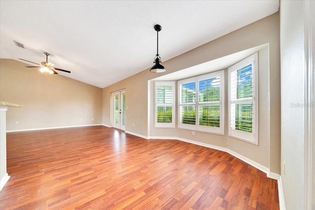 10331 SW 45th Ave, Ocala, FL 34476 - spare room with light wood-style flooring, lofted ceiling, and a ceiling fan