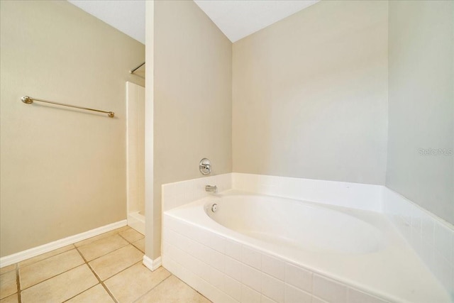 10331 SW 45th Ave, Ocala, FL 34476 - full bathroom featuring a bath, tile patterned floors, and walk in shower