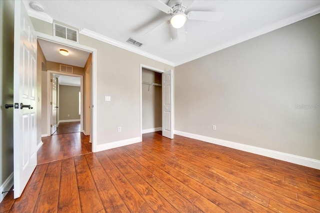 10331 SW 45th Ave, Ocala, FL 34476 - unfurnished bedroom featuring ornamental molding, hardwood / wood-style floors, a closet, and a ceiling fan