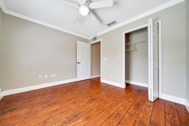 10331 SW 45th Ave, Ocala, FL 34476 - unfurnished bedroom with hardwood / wood-style flooring, ornamental molding, a closet, and a ceiling fan