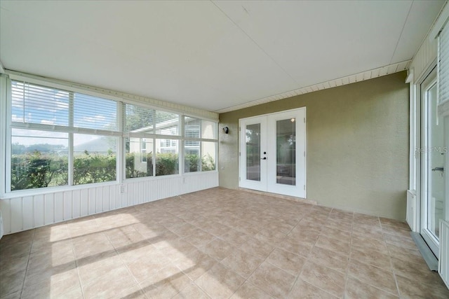 10331 SW 45th Ave, Ocala, FL 34476 - unfurnished sunroom featuring french doors, healthy amount of natural light, and tile patterned flooring