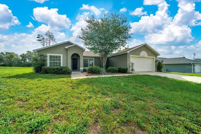 10331 SW 45th Ave, Ocala, FL 34476 - ranch-style home with stucco siding, a garage, concrete driveway, and a front yard