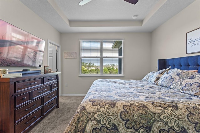 3467 Buoy Cir, Winter Garden, FL 34787 - bedroom with carpet flooring, a tray ceiling, and ceiling fan