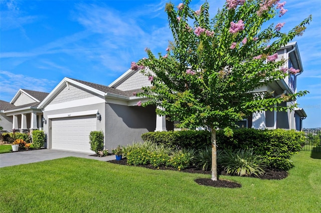 3467 Buoy Cir, Winter Garden, FL 34787 - view of front of home with an attached garage, stucco siding, driveway, and a front yard