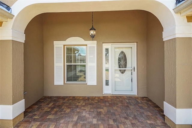 2880 Manor Downs, The Villages, FL 32162 - property entrance featuring stucco siding