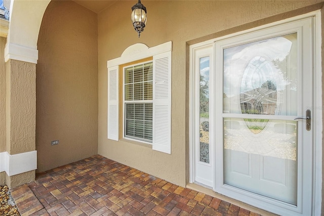 2880 Manor Downs, The Villages, FL 32162 - view of exterior entry with stucco siding