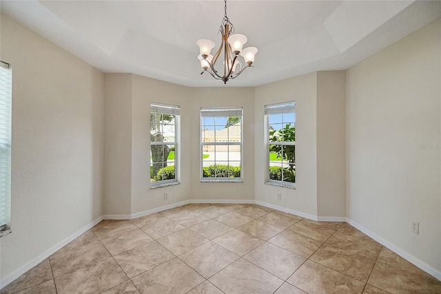 2880 Manor Downs, The Villages, FL 32162 - tiled spare room with a chandelier and a tray ceiling