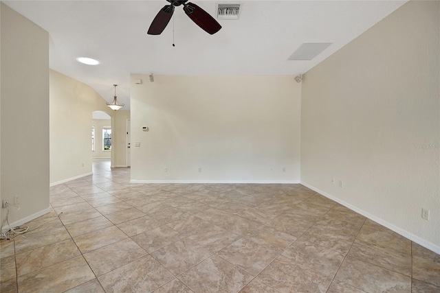 2880 Manor Downs, The Villages, FL 32162 - spare room featuring arched walkways, a ceiling fan, and vaulted ceiling