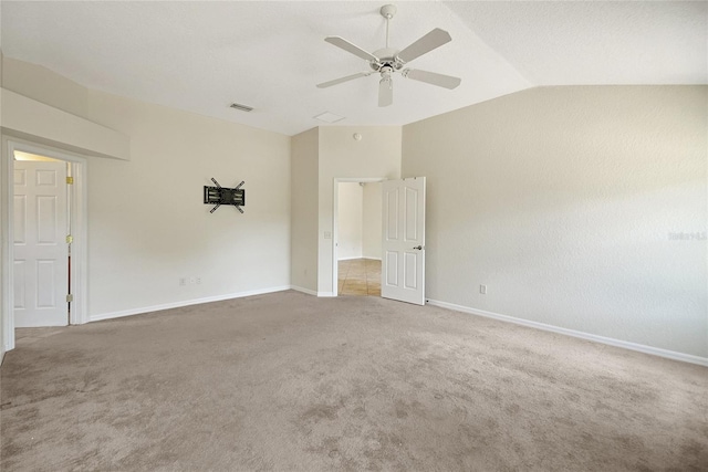 2880 Manor Downs, The Villages, FL 32162 - unfurnished room featuring vaulted ceiling, a ceiling fan, and carpet flooring