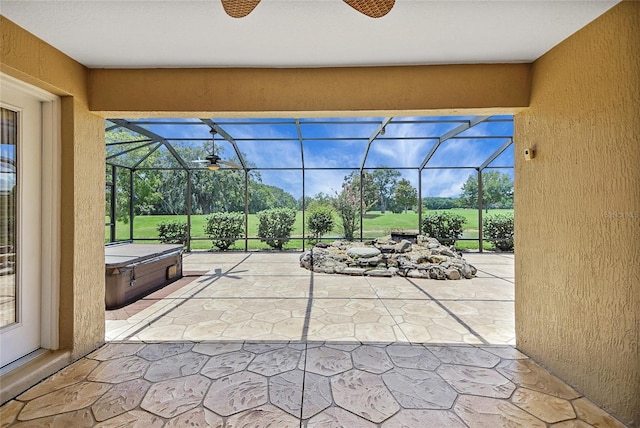 2880 Manor Downs, The Villages, FL 32162 - view of patio featuring a hot tub and a lanai