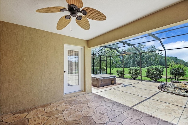 2880 Manor Downs, The Villages, FL 32162 - view of patio featuring a hot tub, glass enclosure, and ceiling fan