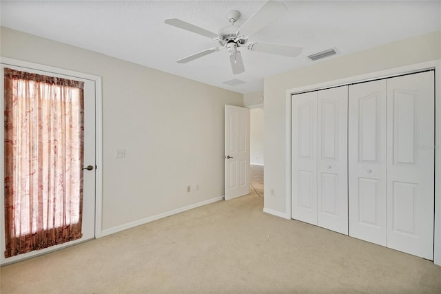2880 Manor Downs, The Villages, FL 32162 - unfurnished bedroom with multiple windows, carpet flooring, a closet, and ceiling fan