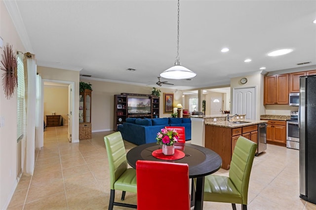 1702 Hoofprint Ct, Fruitland Park, FL 34731 - dining room with ornamental molding, light tile patterned flooring, a ceiling fan, and recessed lighting