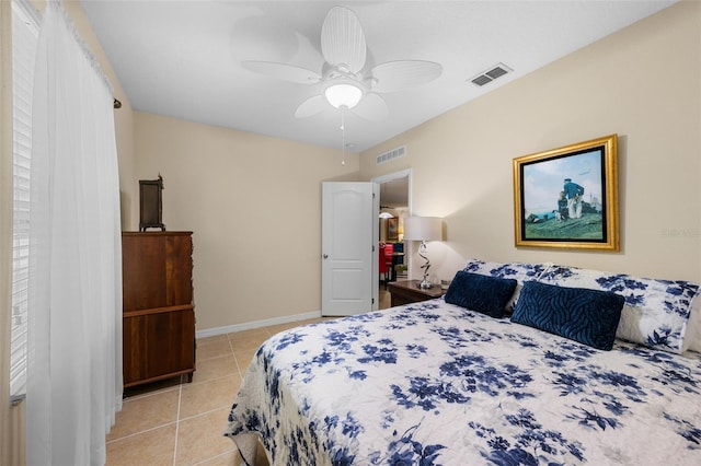 1702 Hoofprint Ct, Fruitland Park, FL 34731 - bedroom featuring light tile patterned flooring and a ceiling fan