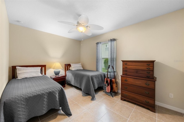 1702 Hoofprint Ct, Fruitland Park, FL 34731 - bedroom with a ceiling fan and light tile patterned floors
