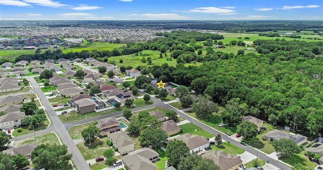 1702 Hoofprint Ct, Fruitland Park, FL 34731 - aerial overview of property's location with nearby suburban area