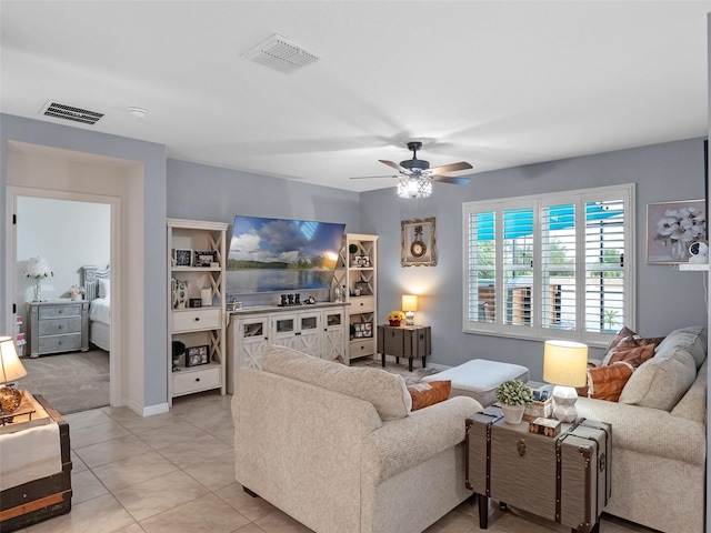 2710 Lilyturf Ct, Tavares, FL 32778 - living area with a ceiling fan and light tile patterned flooring
