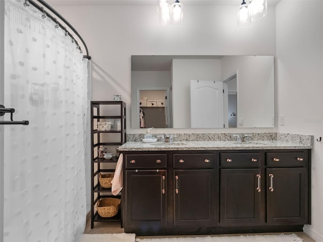 2710 Lilyturf Ct, Tavares, FL 32778 - full bathroom featuring double vanity and a shower with shower curtain
