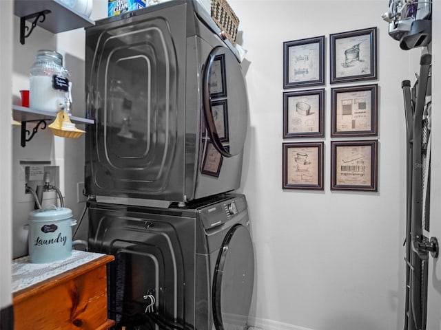 2710 Lilyturf Ct, Tavares, FL 32778 - laundry area featuring stacked washer / dryer and baseboards