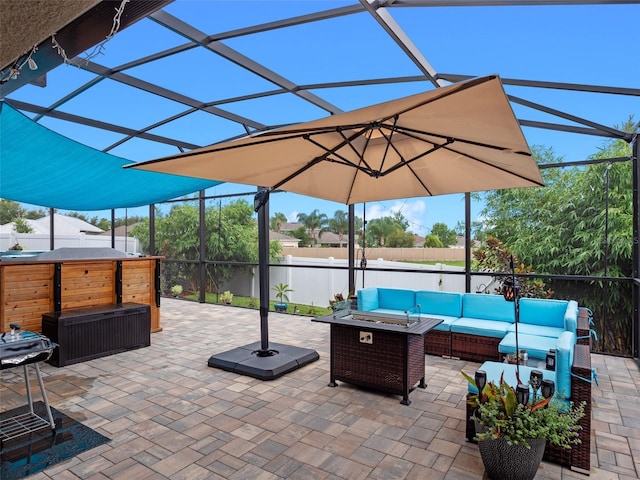 2710 Lilyturf Ct, Tavares, FL 32778 - view of patio with an outdoor living space with a fire pit and a lanai