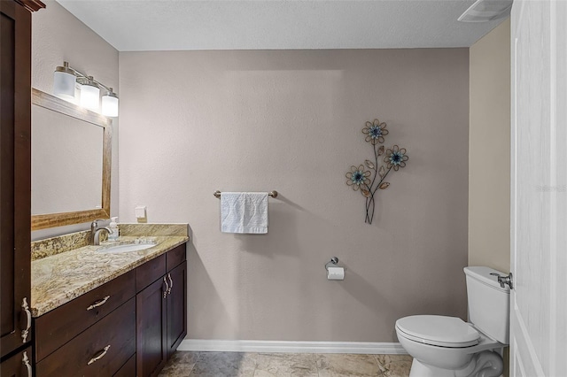 628 Drew Ave, Clermont, FL 34711 - bathroom featuring toilet and vanity