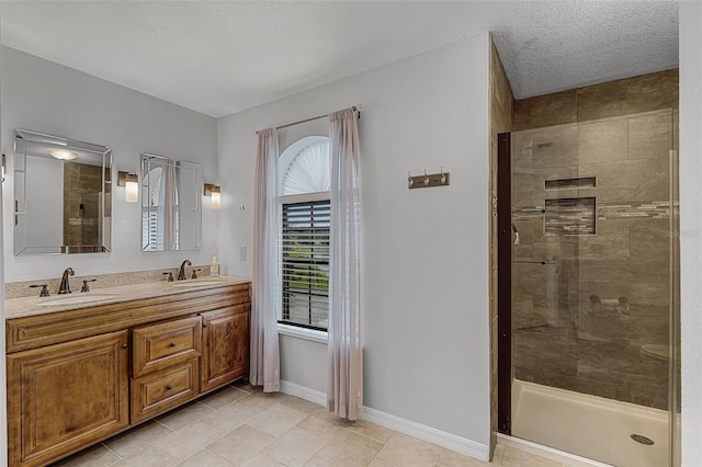 628 Drew Ave, Clermont, FL 34711 - bathroom with double vanity, a shower stall, and tile patterned floors