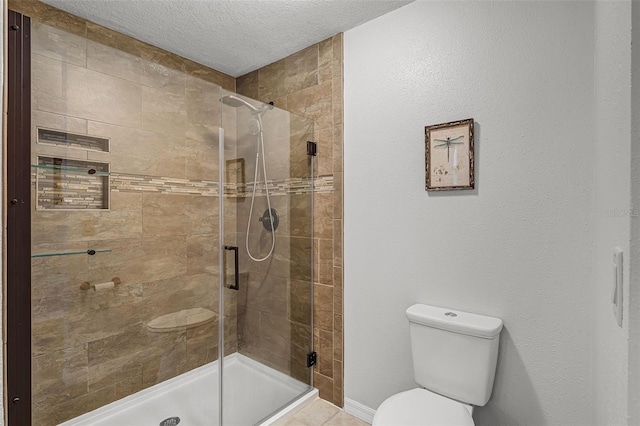 628 Drew Ave, Clermont, FL 34711 - bathroom with a shower stall and a textured ceiling