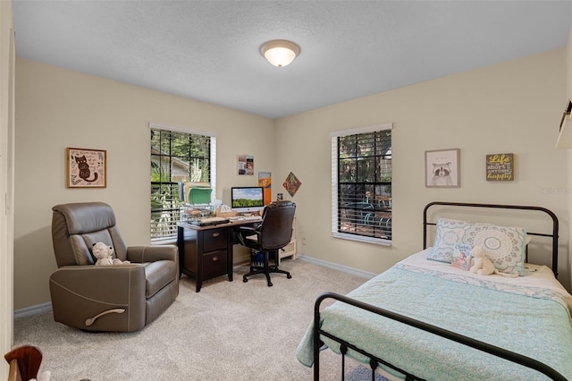 628 Drew Ave, Clermont, FL 34711 - carpeted bedroom with an office area and a textured ceiling