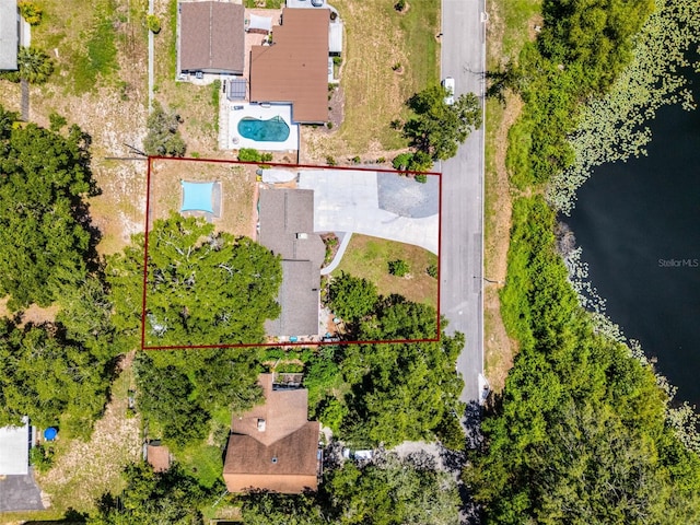 628 Drew Ave, Clermont, FL 34711 - aerial overview of property's location featuring a pool area and property boundaries highlighted