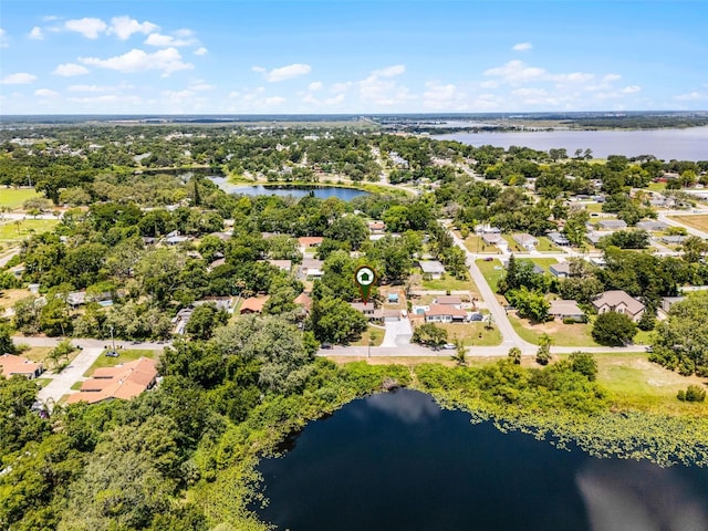 628 Drew Ave, Clermont, FL 34711 - aerial perspective of suburban area featuring a large body of water