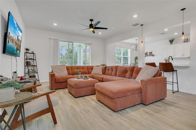 2755 Bobcat Chase Blvd, Oakland, FL 34787 - living area with light wood-style flooring, a ceiling fan, and recessed lighting