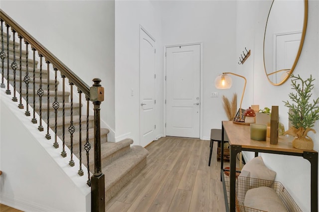 2755 Bobcat Chase Blvd, Oakland, FL 34787 - foyer entrance featuring light wood-style flooring and stairway