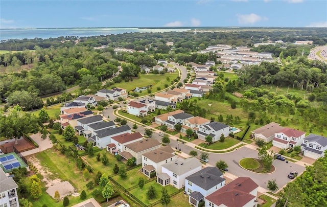 2755 Bobcat Chase Blvd, Oakland, FL 34787 - aerial perspective of suburban area with a nearby body of water