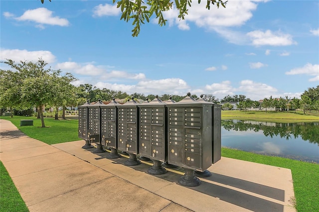 2755 Bobcat Chase Blvd, Oakland, FL 34787 - view of community featuring a water view, mail area, and a lawn