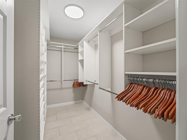 2620 Persimmon Loop, The Villages, FL 32162 - walk in closet featuring tile patterned floors