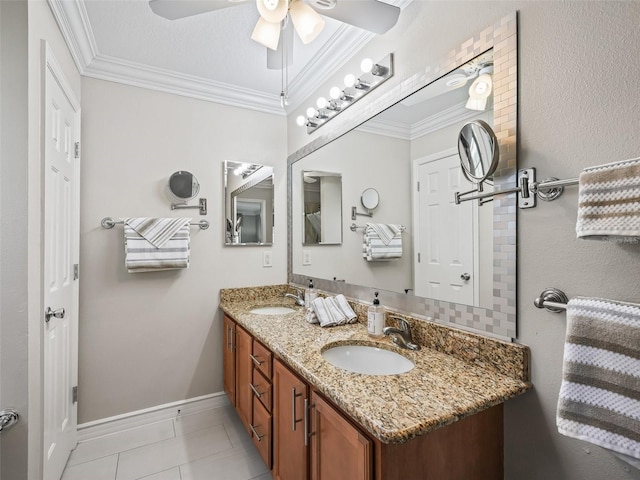 2620 Persimmon Loop, The Villages, FL 32162 - full bathroom featuring a ceiling fan, double vanity, crown molding, and tile patterned floors