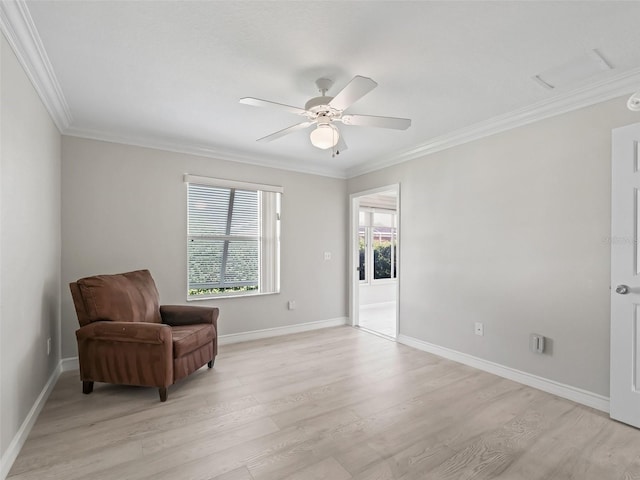 2620 Persimmon Loop, The Villages, FL 32162 - sitting room with ornamental molding, light wood-style flooring, and a ceiling fan