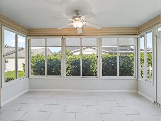 2620 Persimmon Loop, The Villages, FL 32162 - unfurnished sunroom featuring ceiling fan