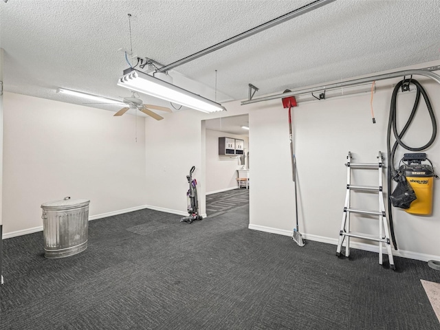 2620 Persimmon Loop, The Villages, FL 32162 - garage with baseboards and a ceiling fan