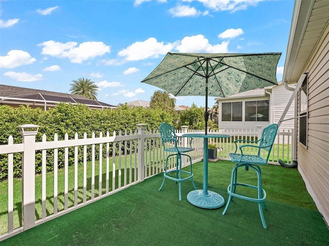 2620 Persimmon Loop, The Villages, FL 32162 - view of patio / terrace featuring a sunroom
