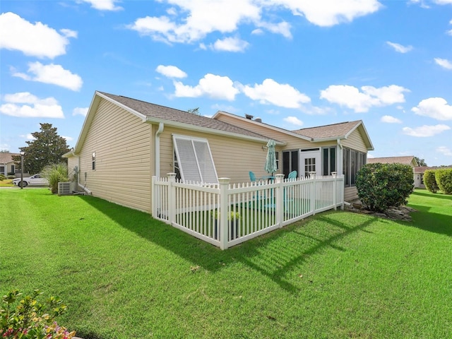 2620 Persimmon Loop, The Villages, FL 32162 - rear view of property featuring a sunroom
