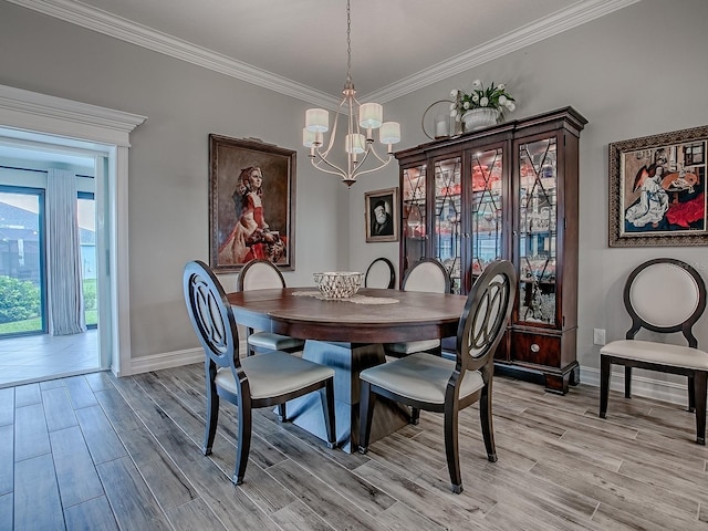 6295 Danielson Loop, The Villages, FL 32163 - dining room featuring a chandelier, light wood-type flooring, and crown molding