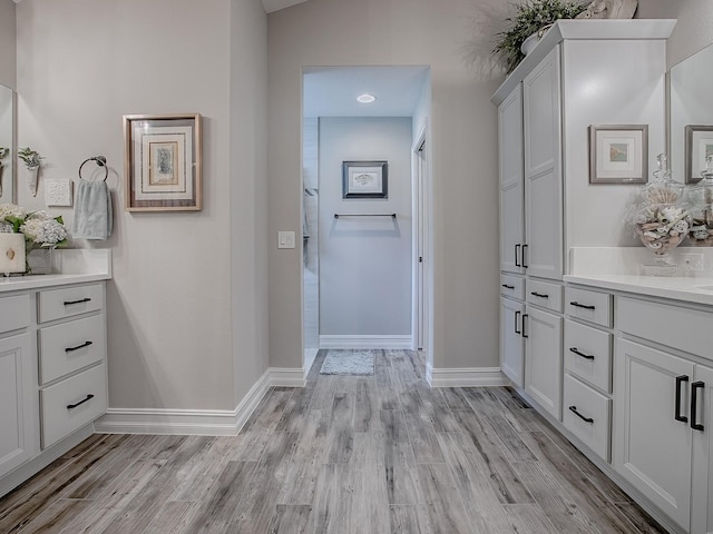 6295 Danielson Loop, The Villages, FL 32163 - doorway featuring light wood-style floors and baseboards