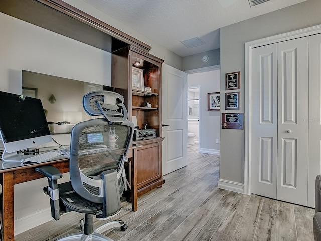 6295 Danielson Loop, The Villages, FL 32163 - office featuring light wood-type flooring and baseboards