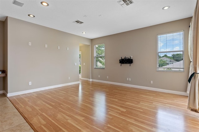 1892 Sanderling Dr, Clermont, FL 34711 - spare room with light wood-style floors and recessed lighting